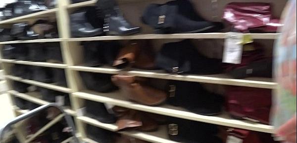  A voyeur with a hidden camera in a public place watches juicy booty. Foot fetish and peeping under a skirt in a shoe store.